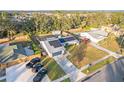 Aerial view showcasing the house, pool, and surrounding neighborhood at 4210 Old Colony Rd, Mulberry, FL 33860
