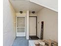 Condo building exterior with walkway and landscaping at 603 Sweet Bay Cir # 603, Winter Haven, FL 33884