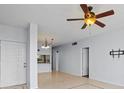 Bright living room with tile floors and view to kitchen at 603 Sweet Bay Cir # 603, Winter Haven, FL 33884
