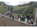 Property showcasing home, vineyard, and waterfront views at 8243 Alturas Rd, Bartow, FL 33830