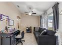 Bright home office space with window and desk at 910 Nancy Ct, Kissimmee, FL 34759