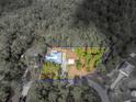 Aerial view of a single-story house with a large yard at 9365 Lemon Dr, Lake Wales, FL 33898