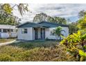 A remodeled one-story home with a manicured lawn at 1244 W 9Th St, Lakeland, FL 33805
