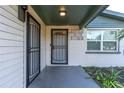The front entrance features a security door and a gray door at 1244 W 9Th St, Lakeland, FL 33805