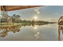 Scenic waterfront view with peaceful sunset reflection at 1769 S Lake Reedy Blvd, Frostproof, FL 33843