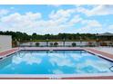 Refreshing community pool with ample deck space for lounging at 235 Lake Suzanne Dr, Lake Wales, FL 33859