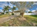 House exterior showcasing a driveway and two-car garage at 357 Magneta Loop, Auburndale, FL 33823