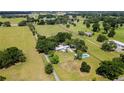 Aerial view showcasing large lot and home at 8375 Ne Jacksonville Rd, Ocala, FL 34479