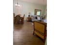 Bright living room featuring hardwood floors and comfortable seating at 3001 Calabria Ave, Davenport, FL 33897