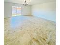 Spacious living room with tile flooring and chandelier at 9115 Se 88Th St, Ocala, FL 34472