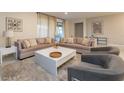 Spacious living room with plush sofas and a coffee table at 8909 Bengal Ct, Kissimmee, FL 34747