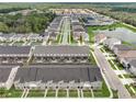 Community overview showcasing townhomes and landscape at 1688 Tropical Palms Cir, Kissimmee, FL 34747