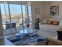 Spacious living room with balcony access at 1097 Splash Shot # 1097, Davenport, FL 33896