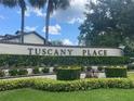 Tuscany Place community entrance with landscaping at 600 Northern Way # 108, Winter Springs, FL 32708