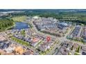 Aerial view showing home's location in Island Village with clubhouse and pool at 7401 Levee Ln, Celebration, FL 34747