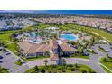 Community pool with expansive deck and surrounding homes at 1193 Drop Ln # 1193, Davenport, FL 33896