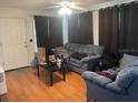 Living Room with hardwood floors and access to the front door at 375 Lakepointe Dr # 101, Altamonte Springs, FL 32701