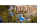 Resort-style community with large pool and lake at 14501 Grove Resort Ave # 1637, Winter Garden, FL 34787