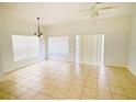 Spacious dining room with tile flooring and lots of natural light at 2374 Caravelle Cir, Kissimmee, FL 34746