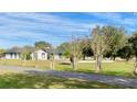 Ranch style home with large lawn at 6747 Whispering Pines Rd, Orlando, FL 32824