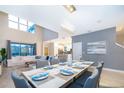 Elegant dining room with large table and chandelier at 2811 Bookmark Dr, Kissimmee, FL 34746