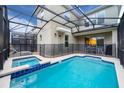 Private pool and spa with screened enclosure at 2811 Bookmark Dr, Kissimmee, FL 34746