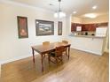 Bright dining area with kitchen passthrough at 8010 Tuscany Way # 3103, Davenport, FL 33896