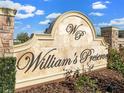 Stone entrance sign for William's Preserve community at 184 Primrose Dr, Davenport, FL 33837