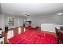 Spacious living room with hardwood floors and comfy seating at 1001 Via Capri Ln # 204, Celebration, FL 34747