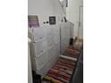 Bright entryway with storage and colorful rug at 6016 Westgate Dr # 301, Orlando, FL 32835