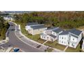 Modern homes community aerial view, showcasing contemporary architecture and landscaping at 4577 Target Blvd, Kissimmee, FL 34746