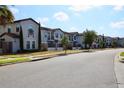 Townhouses with attractive exteriors situated on a quiet street at 121 Kenny Blvd, Haines City, FL 33844