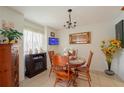 Cozy dining area featuring a wood table and chairs at 5038 Downing St # 7, Orlando, FL 32839