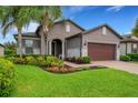 Single-Gathering home with landscaped yard and brick driveway at 668 Cordoba Dr, Davenport, FL 33837
