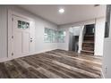 Bright living room with hardwood floors and fireplace at 1419 36Th St, Orlando, FL 32839