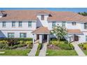 Aerial view of three-story townhome building at 8919 Stinger Dr, Davenport, FL 33896