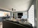 Spacious living room with a large TV and comfortable seating at 1536 Espanola Ave, Holly Hill, FL 32117