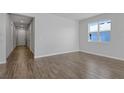 Bright living room with tile floors and access to backyard at 4248 Sawtooth Ct, Tavares, FL 32778