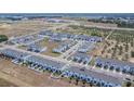 Aerial view of a large townhome community, highlighting the neighborhood's scale and layout at 350 Madison Dr, Davenport, FL 33837