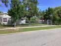House with chain link fence, street view at 101 Albert St, Winter Springs, FL 32708