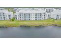 Apartment building sits on the lakeshore at 3121 Paradox Circle 207 # 207, Kissimmee, FL 34746