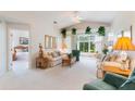 Bright living room with vaulted ceilings, and view of the backyard at 114 Ridge View Dr, Davenport, FL 33837