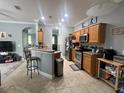Well-equipped kitchen featuring ample cabinetry and stainless steel appliances at 7132 Five Oaks Dr, Saint Cloud, FL 34773