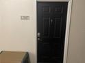 Condo front door entrance with black door and number 12107 at 239 Longview Ave # 107, Celebration, FL 34747