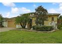 One story house with attractive landscaping and driveway at 694 Irvine Ranch Rd, Kissimmee, FL 34759
