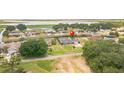 Aerial view of waterfront property at 720 Shore Drive, Kissimmee, FL 34744