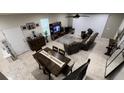 Spacious living room with a dining area, and a modern aesthetic at 701 Virtuoso Ln # 81, Orlando, FL 32824