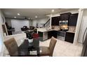 Modern kitchen with stainless steel appliances and granite countertops at 701 Virtuoso Ln # 81, Orlando, FL 32824
