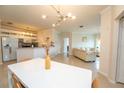 Open concept dining room and kitchen with modern decor at 3593 Conroy Rd # 437, Orlando, FL 32839