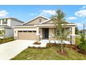 Charming one-story home with stone accents at 176 Flag Lilly Ln, Umatilla, FL 32784